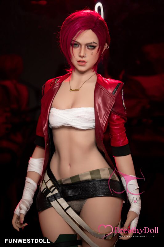 Red-haired, realistic companion doll with a youthful face, striking eyes, and detailed features, dressed in a red leather jacket, white bandeau top, and stylish accessories for a bold, contemporary look.