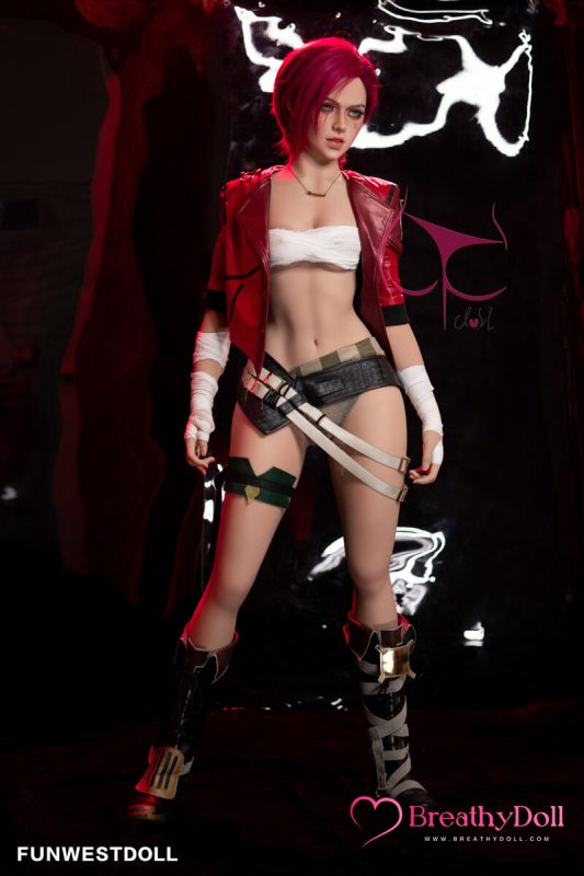 Red-haired realistic companion doll dressed in a red jacket, white bandeau top, camouflage and black shorts, and combat boots, standing confidently in a dark, edgy setting.