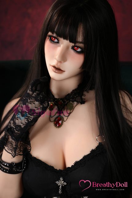 Detailed realistic doll with deep red eyes, long black hair, and Gothic-inspired attire. Features intricate accessories, lace gloves, and a striking expression for a captivating appearance.